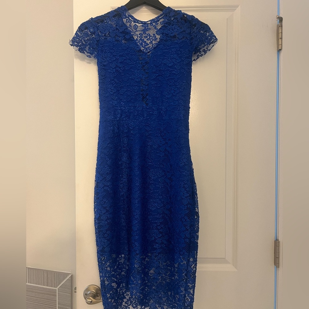Royal blue lace dress with slit. Size XS. Mock neckline with lace cut out